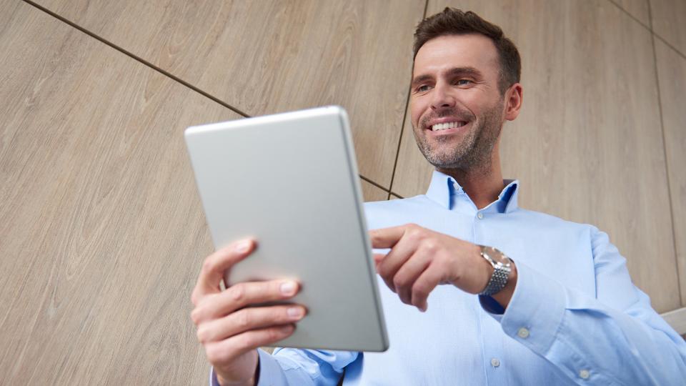 Property owner reviewing management updates